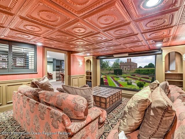 19 Russell Road Freehold, NJ 07728 - Photo 39 of 68 a living room with furniture and a floor to ceiling window