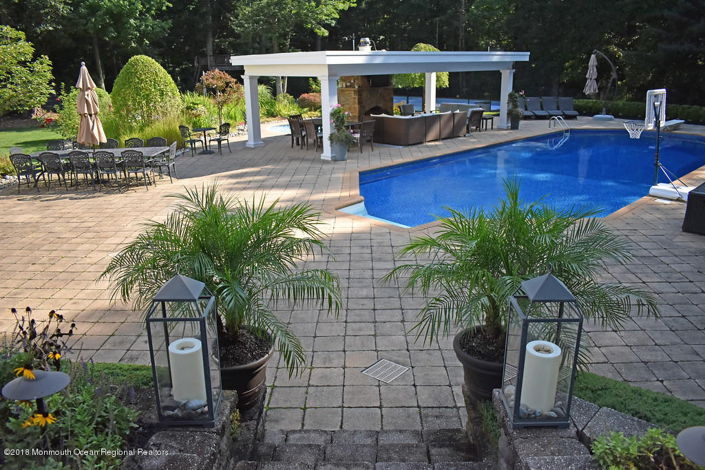 19 Russell Road Freehold, NJ 07728 - Photo 50 of 68 a view of outdoor space yard deck and patio