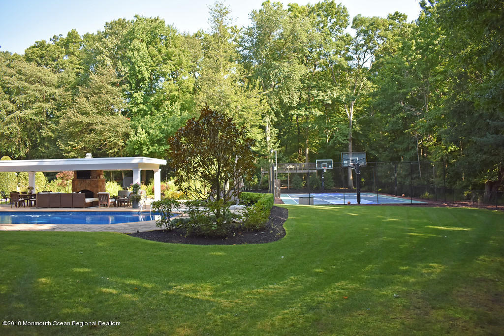 19 Russell Road Freehold, NJ 07728 - Photo 61 of 68 a view of house with backyard space and garden