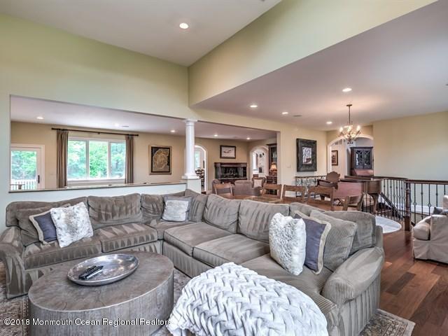 19 Russell Road Freehold, NJ 07728 - Photo 10 of 68 a living room with furniture and a large window