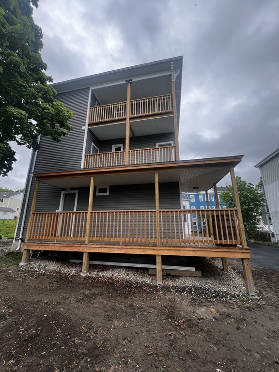 19 Reeves Street Worcester, MA 01607 - Photo 30 of 30 front view of a house with a deck