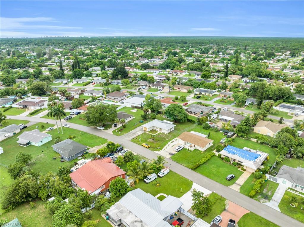 4333 20th Place Southwest Naples, FL 34116 - Photo 29 of 31 an aerial view of residential houses with outdoor space