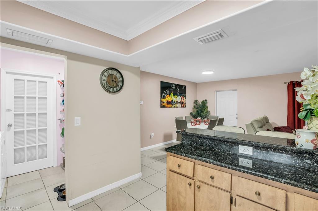 4333 20th Place Southwest Naples, FL 34116 - Photo 8 of 31 a view of a and a kitchen with a sink