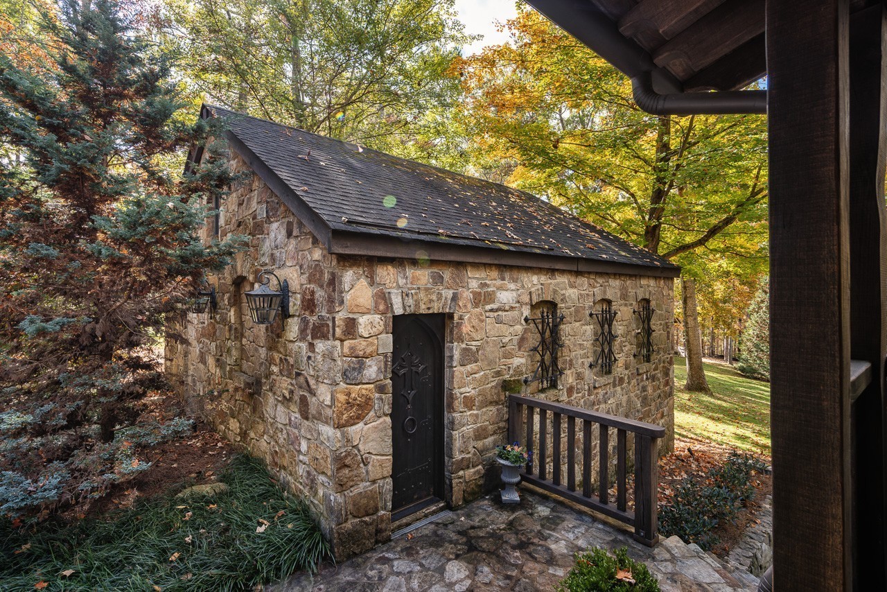 5551 Parker Branch Road Franklin, TN 37064 - Photo 60 of 67 a view of a wooden house with a large window