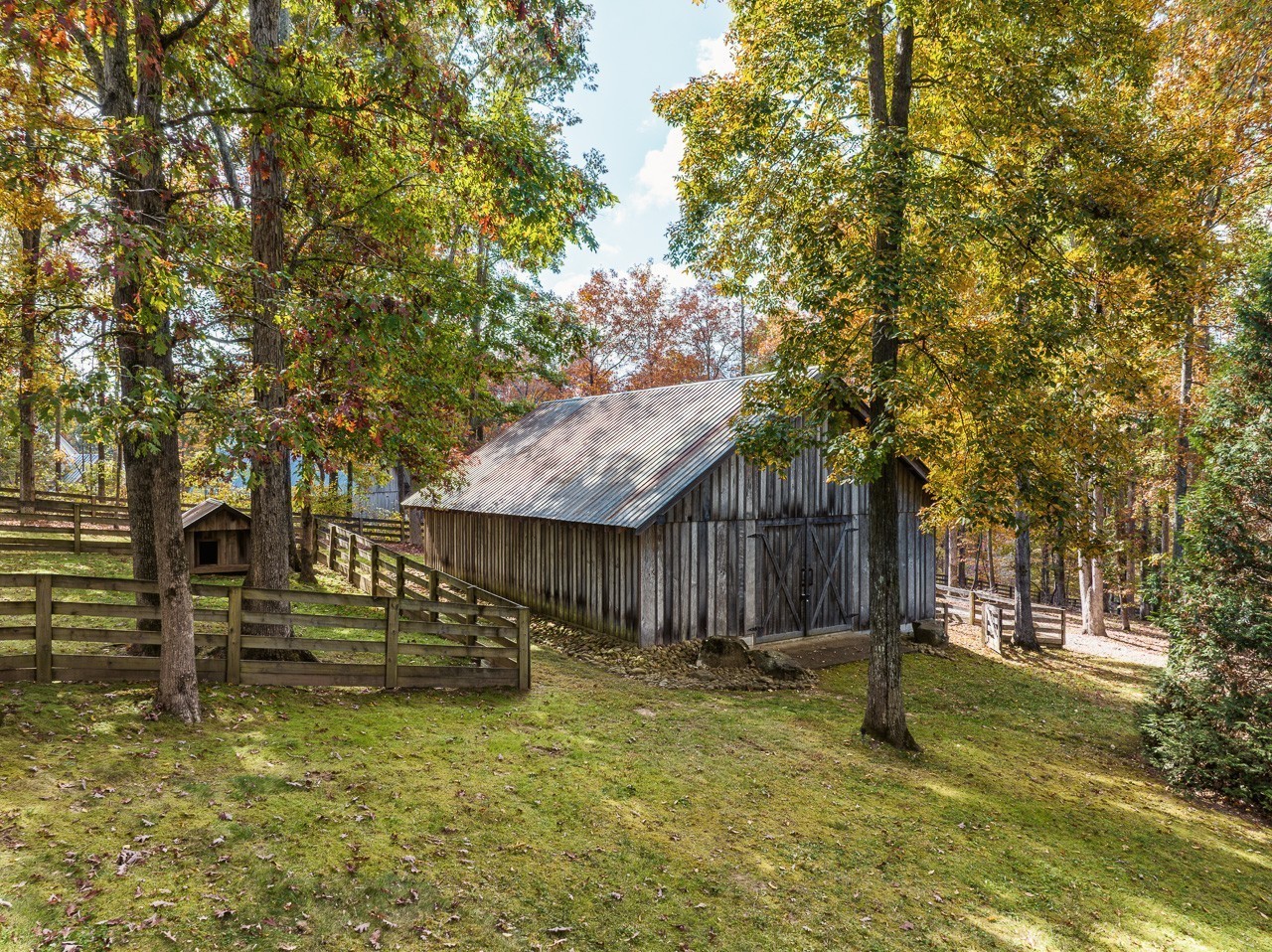 5551 Parker Branch Road Franklin, TN 37064 - Photo 64 of 67 a view of a house with large tree and wooden fence