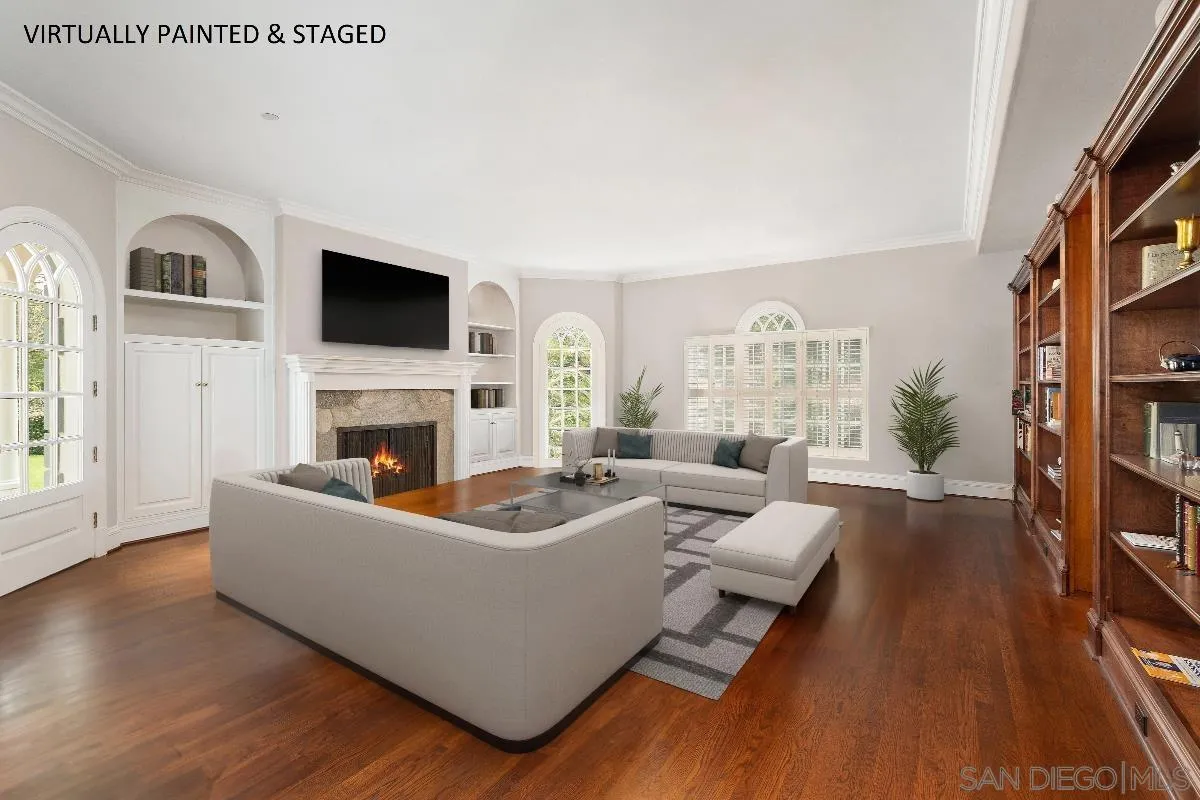 17032 Circa Oriente Rancho Santa Fe, CA 92067 - Photo 13 of 75 a living room with furniture fireplace and flat screen tv