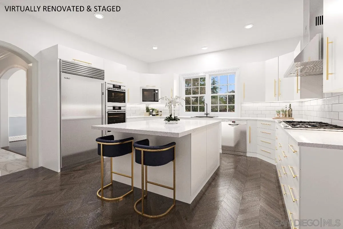 17032 Circa Oriente Rancho Santa Fe, CA 92067 - Photo 18 of 75 a kitchen with a sink stove and white cabinets