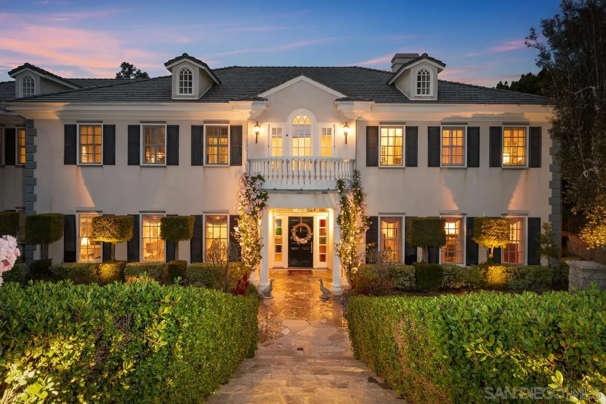 17032 Circa Oriente Rancho Santa Fe, CA 92067 - Photo 2 of 75 a front view of a house with a yard