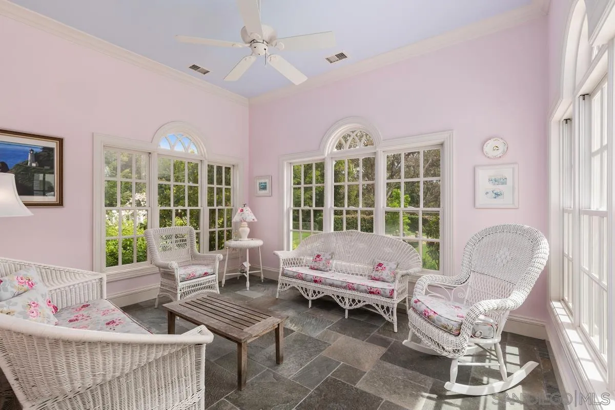 17032 Circa Oriente Rancho Santa Fe, CA 92067 - Photo 25 of 75 a living room with furniture and windows