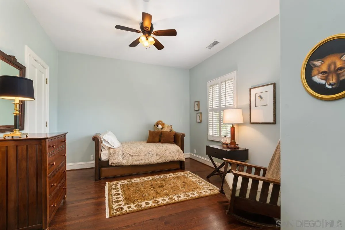 17032 Circa Oriente Rancho Santa Fe, CA 92067 - Photo 44 of 75 a bed room with a bed furniture and a window