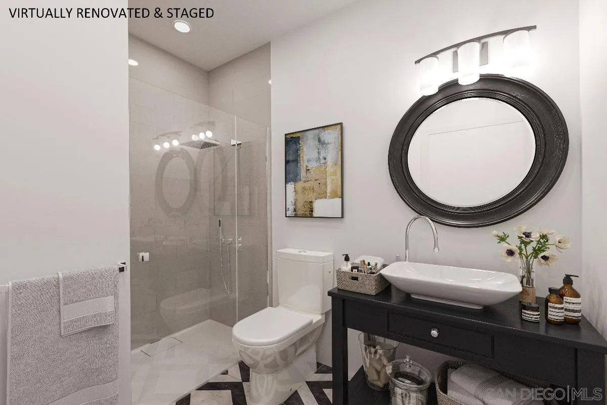 17032 Circa Oriente Rancho Santa Fe, CA 92067 - Photo 46 of 75 a bathroom with a sink a toilet and a mirror