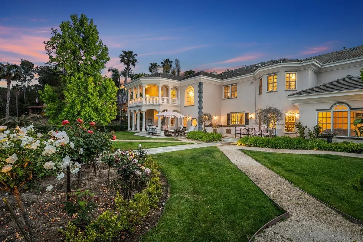 17032 Circa Oriente Rancho Santa Fe, CA 92067 - Photo 57 of 75 a front view of a house with a yard