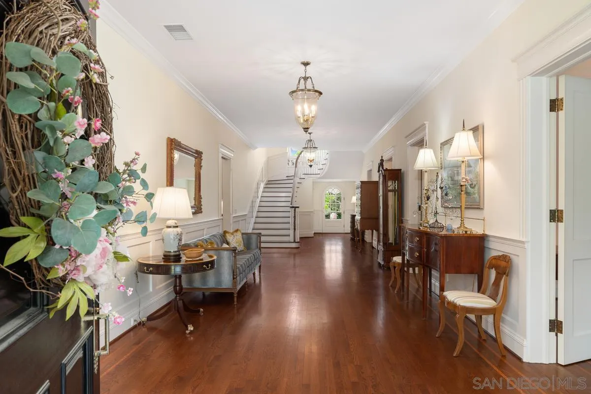 17032 Circa Oriente Rancho Santa Fe, CA 92067 - Photo 6 of 75 a living room with furniture and wooden floor