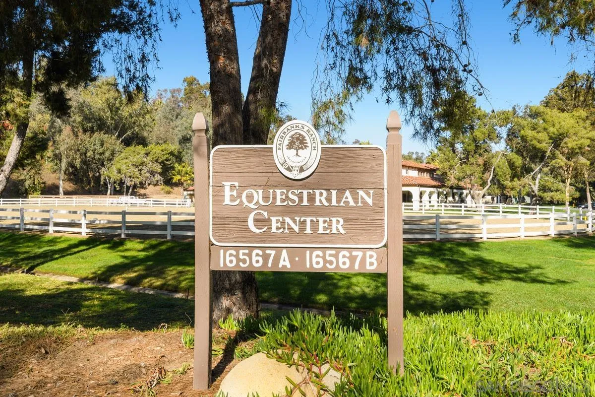 17032 Circa Oriente Rancho Santa Fe, CA 92067 - Photo 63 of 75 a sign that is sitting on a brick wall