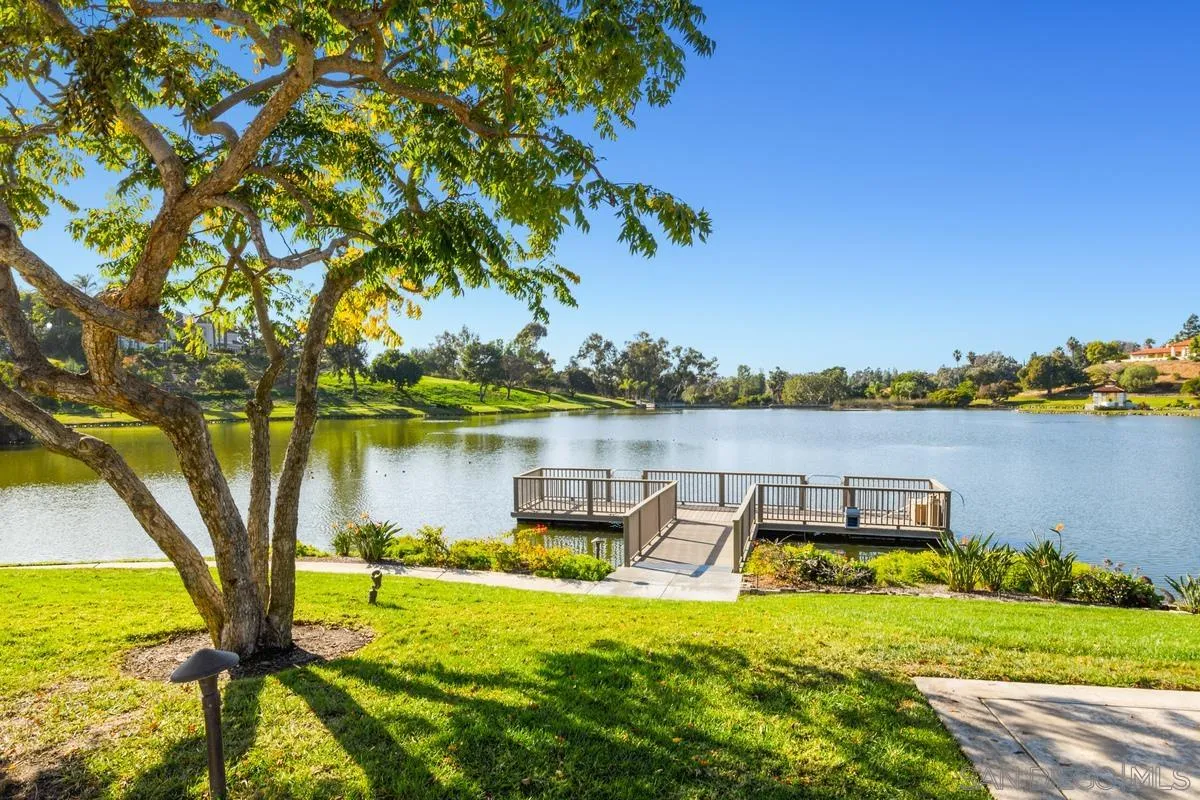 17032 Circa Oriente Rancho Santa Fe, CA 92067 - Photo 69 of 75 a view of a lake with houses in the back