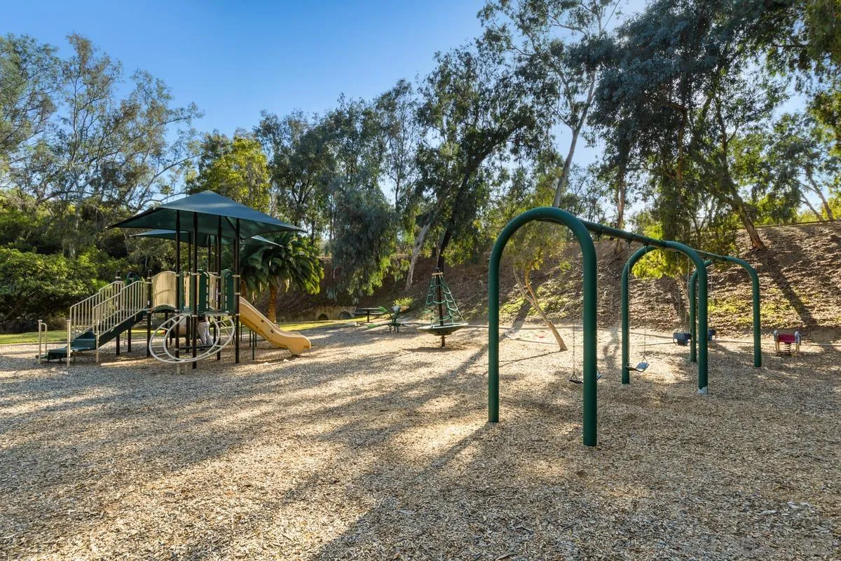 17032 Circa Oriente Rancho Santa Fe, CA 92067 - Photo 74 of 75 a view of a park with swings and slides