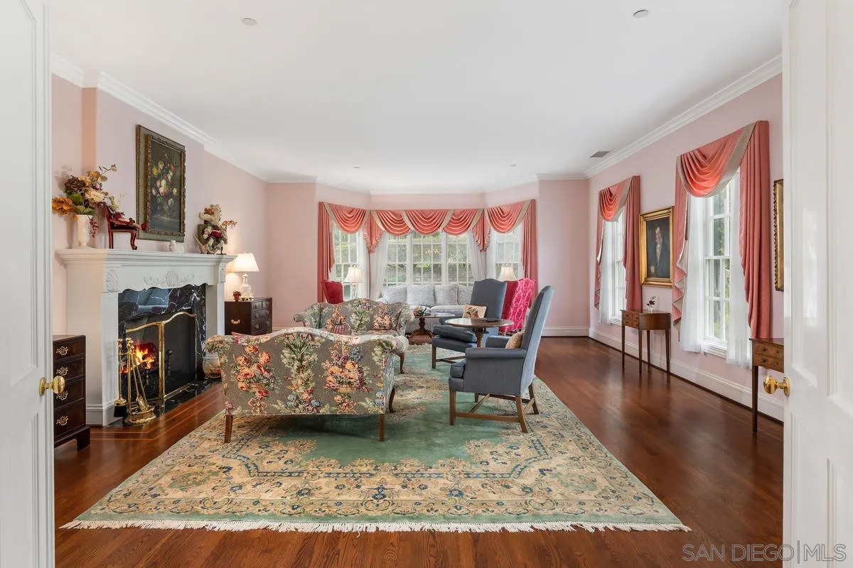 17032 Circa Oriente Rancho Santa Fe, CA 92067 - Photo 8 of 75 a living room with furniture and a fireplace