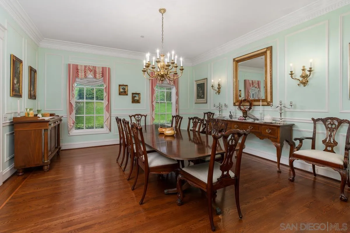 17032 Circa Oriente Rancho Santa Fe, CA 92067 - Photo 10 of 75 a dining room with furniture a chandelier and wooden floor