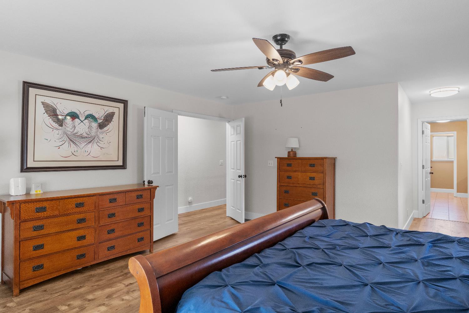637 Rebekah Court Ripon, CA 95366 - Photo 48 of 69 a bedroom with a bed and a dresser