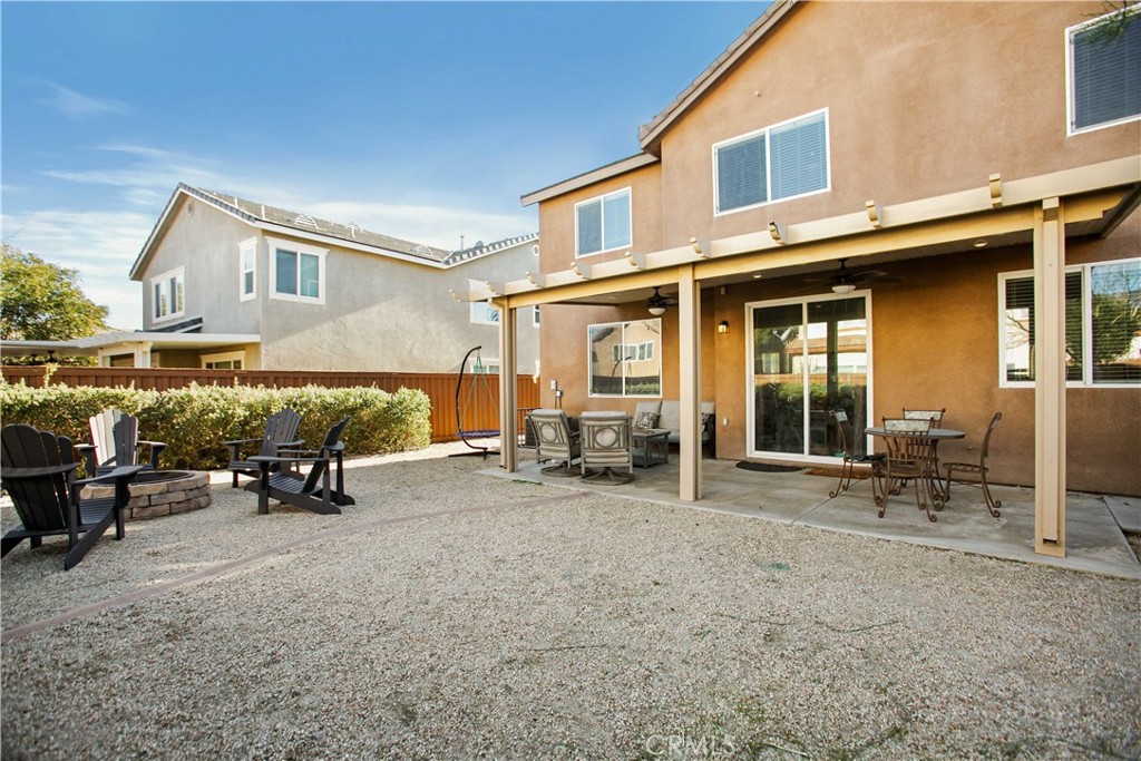 3866 Obsidian Road San Bernardino, CA 92407 - Photo 42 of 64 a view of a house with patio