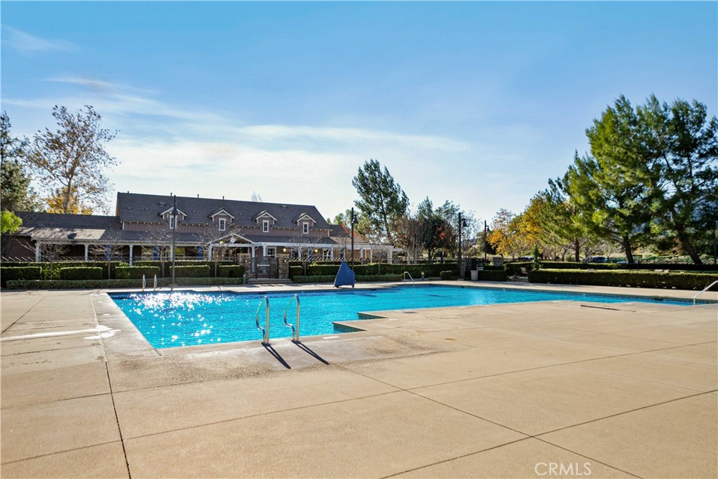 3866 Obsidian Road San Bernardino, CA 92407 - Photo 44 of 64 a view of swimming pool with lounge chair
