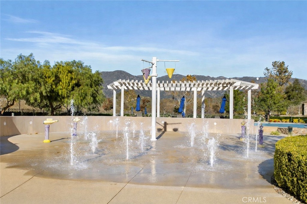 3866 Obsidian Road San Bernardino, CA 92407 - Photo 45 of 64 You won't be able to keep the little ones out! Who knows, you may even want to run through to cool off on a hot summer day. This photo has been virtually enhanced.
