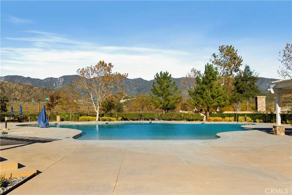 3866 Obsidian Road San Bernardino, CA 92407 - Photo 50 of 64 Here is a view of the 2nd pool. You will feel like you are at a resort with those beautiful mountains as your backdrop!