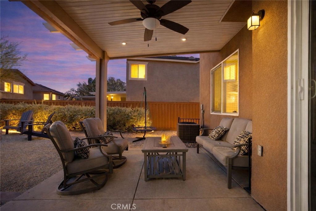 3866 Obsidian Road San Bernardino, CA 92407 - Photo 5 of 64 a living room with furniture and a large window