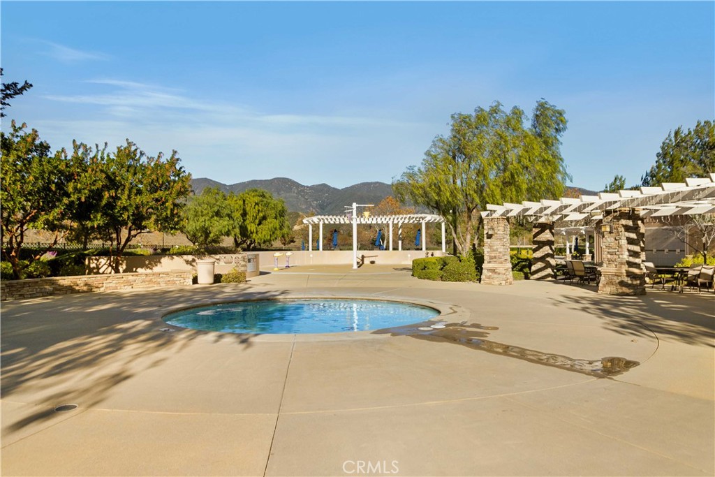 3866 Obsidian Road San Bernardino, CA 92407 - Photo 51 of 64 a view of road with large trees