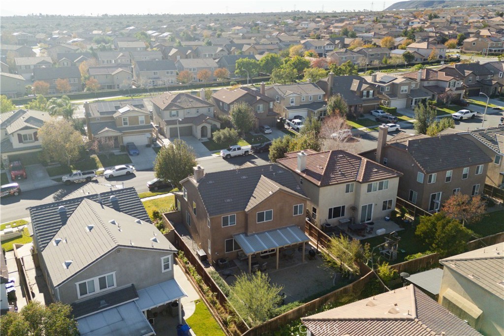3866 Obsidian Road San Bernardino, CA 92407 - Photo 63 of 64 an aerial view of residential houses with outdoor space