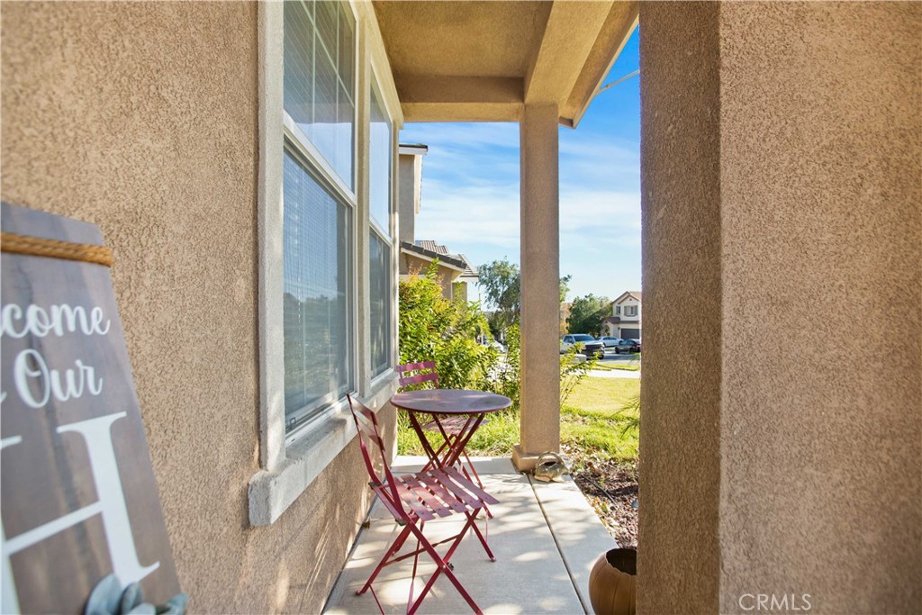 3866 Obsidian Road San Bernardino, CA 92407 - Photo 9 of 64 A charming porch provides a pleasant spot to relax and enjoy the neighborhood surroundings.