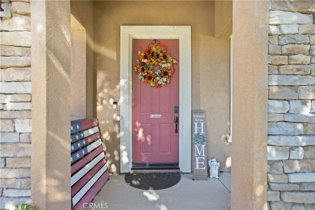 3866 Obsidian Road San Bernardino, CA 92407 - Photo 10 of 64 a view of a hallway with front door