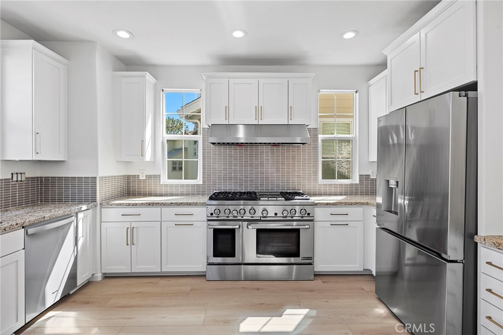 27 Rinehart Road Ladera Ranch, CA 92694 - Photo 15 of 50 New Shaker Cabinets, hardware, designer backsplash