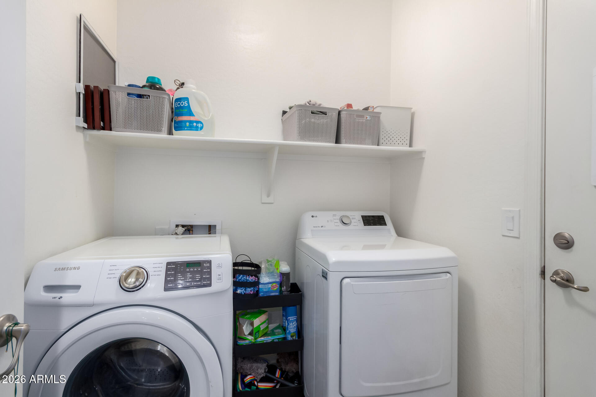 21057 West Almeria Road Buckeye, AZ 85396 - Photo 23 of 49 a utility room with dryer and washer