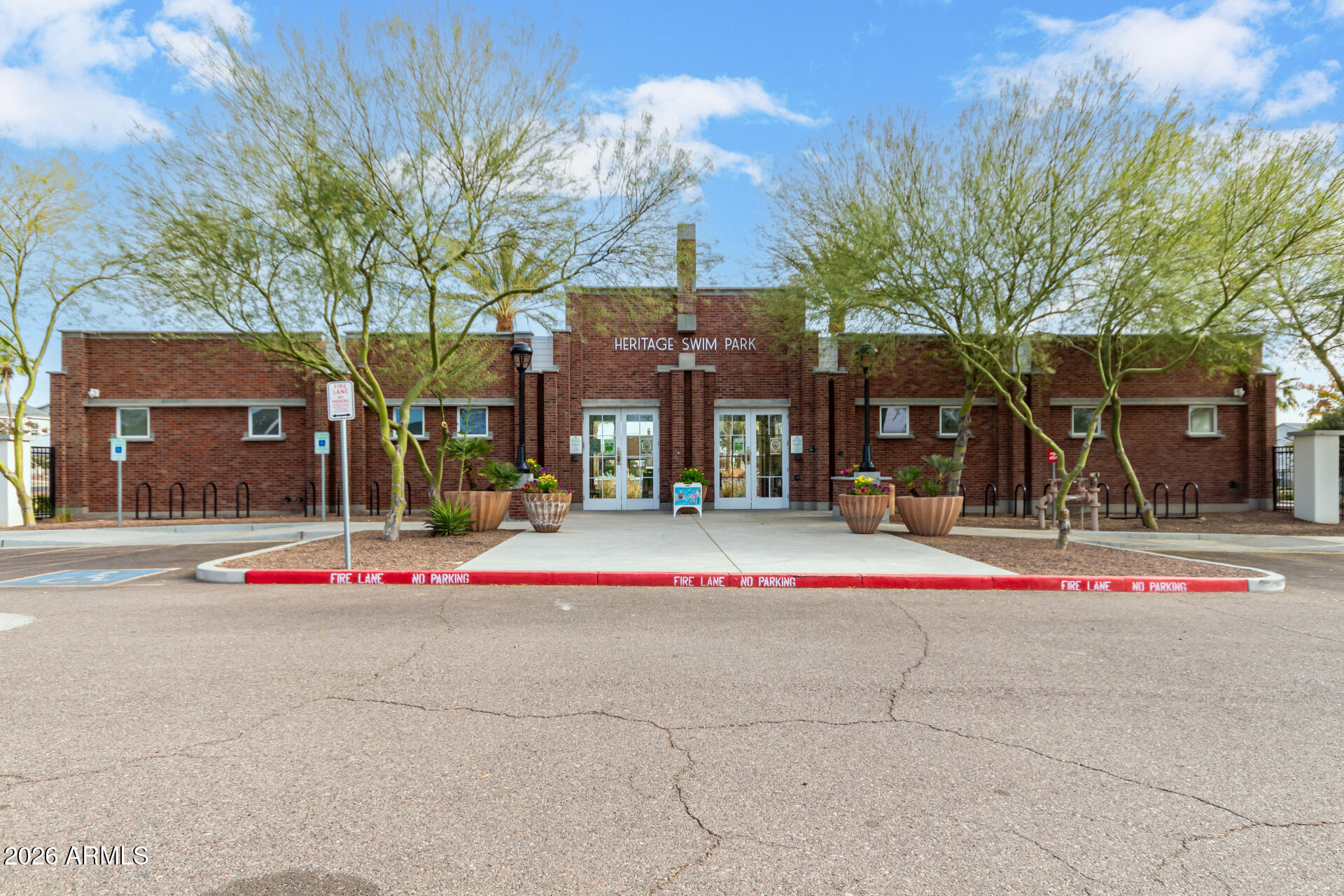 21057 West Almeria Road Buckeye, AZ 85396 - Photo 35 of 49 a front view of a building with street