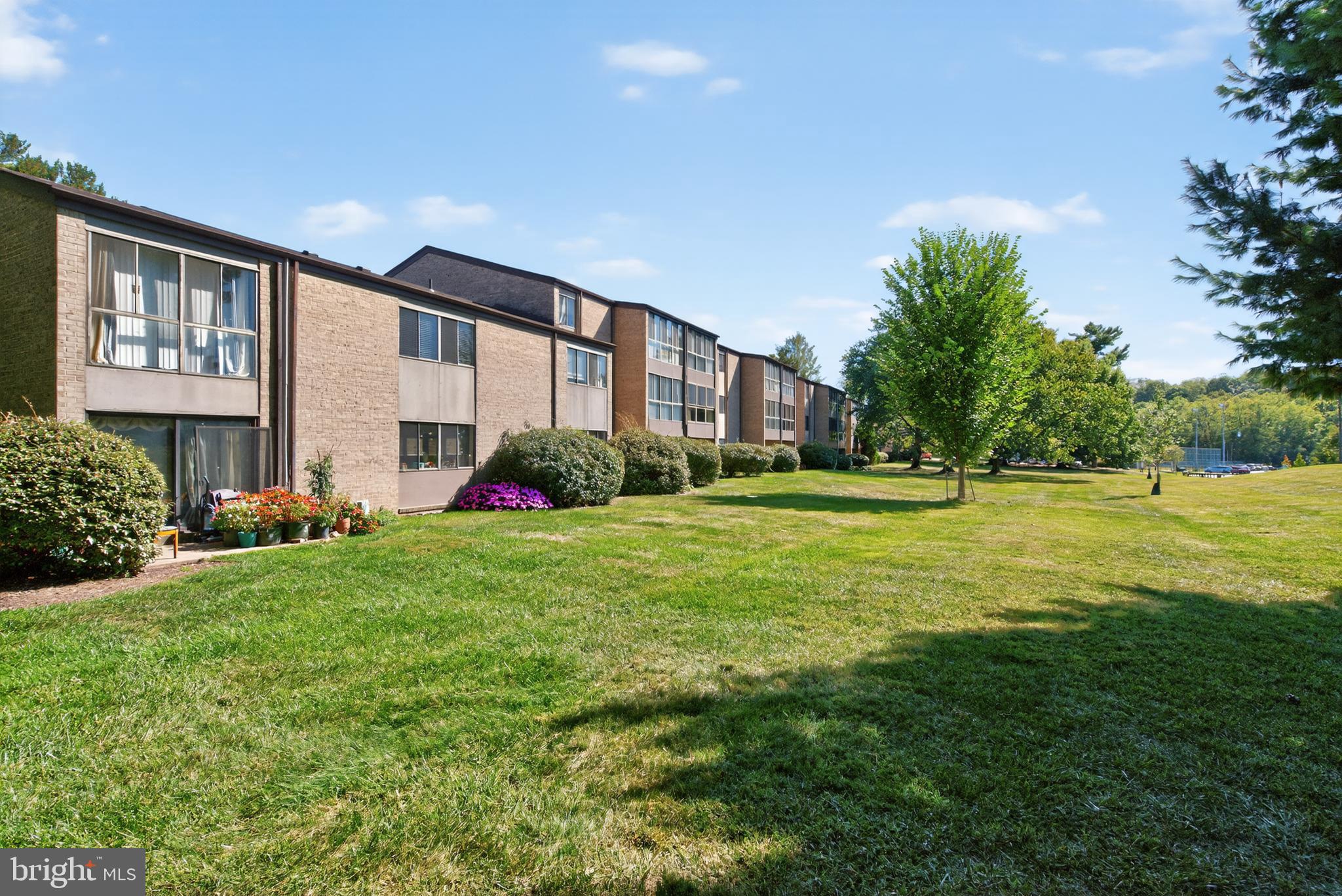 18910 Smoothstone Way, Unit 4 Montgomery Village, MD 20886 - Photo 24 of 30 a front view of house with yard and green space