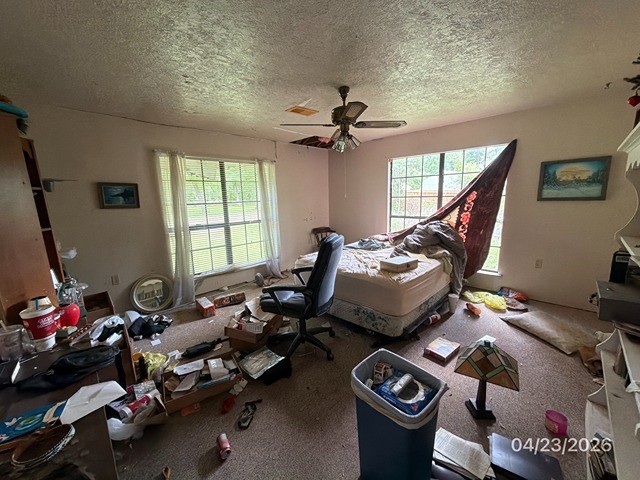 10580 Greenridge Road Conroe, TX 77303 - Photo 4 of 10 a living room with furniture a air conditioner vent and a window
