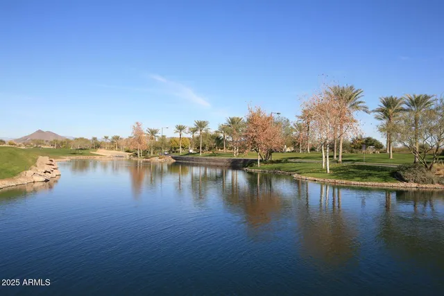 a view of a lake with a big yard