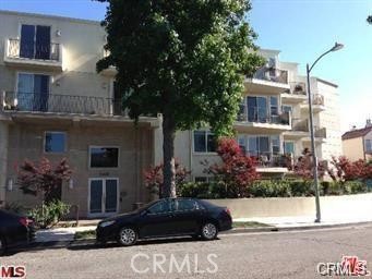 14412 Killion Street Sherman Oaks, CA 91401 - Photo 1 of 21 a front view of a house with a yard