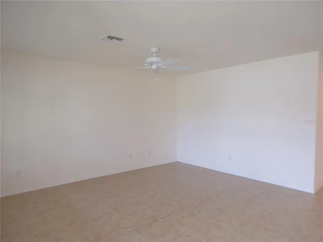 a bathroom with a granite countertop toilet sink and shower
