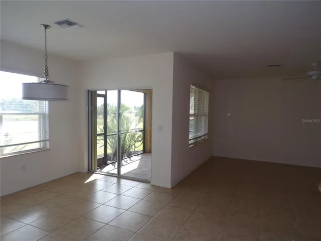 a view of a room with windows