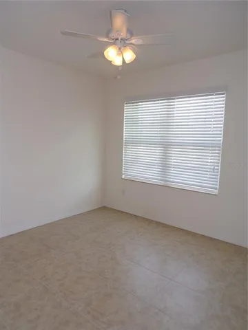 a kitchen with stainless steel appliances granite countertop a sink and a refrigerator