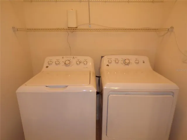 a view of a room with racks on the wall