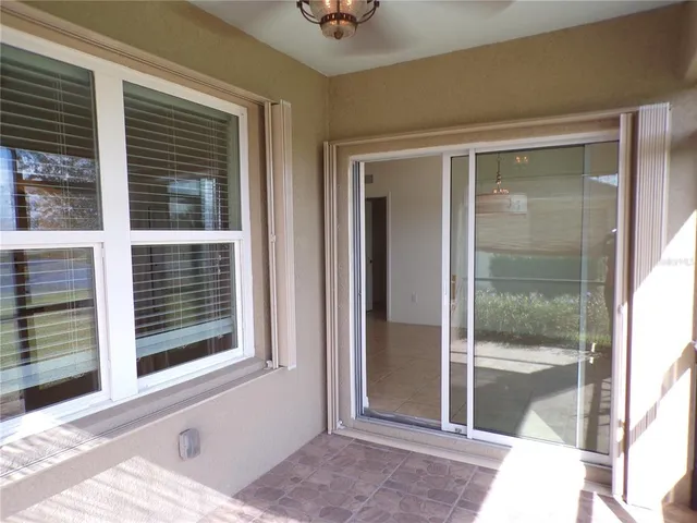 a view of a door and a window