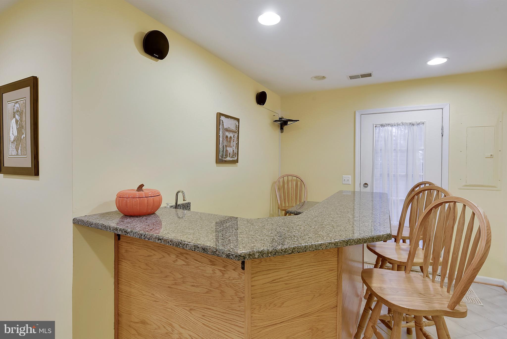 1270 Wild Hawthorn Way Reston, VA 20194 - Photo 19 of 26 Granite topped bar with sink