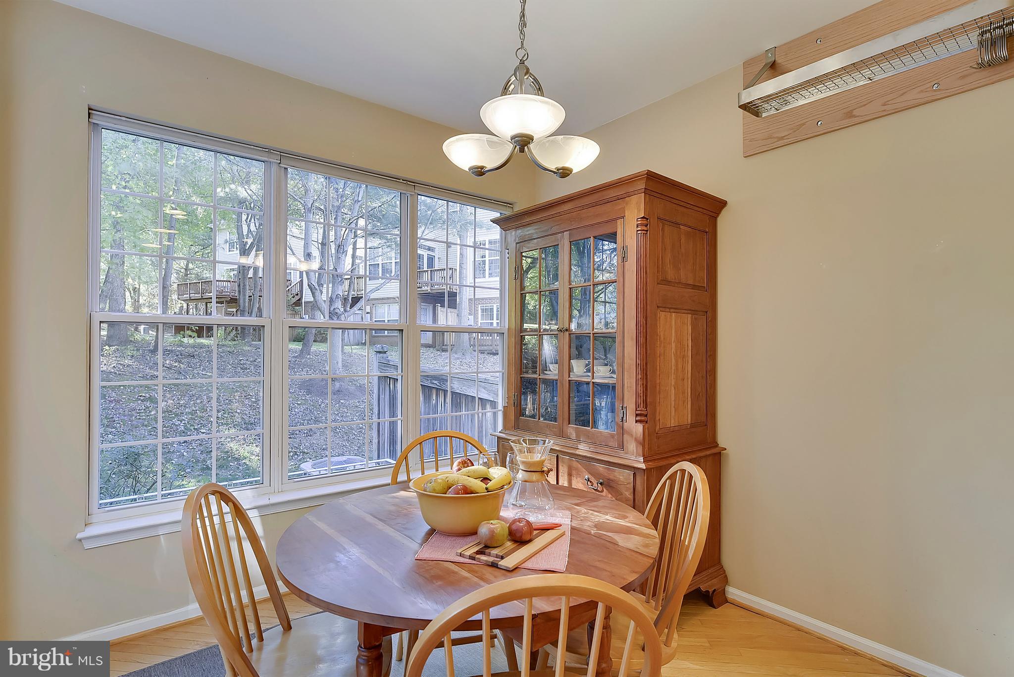 1270 Wild Hawthorn Way Reston, VA 20194 - Photo 4 of 26 Breakfast area overlooks deck and trees