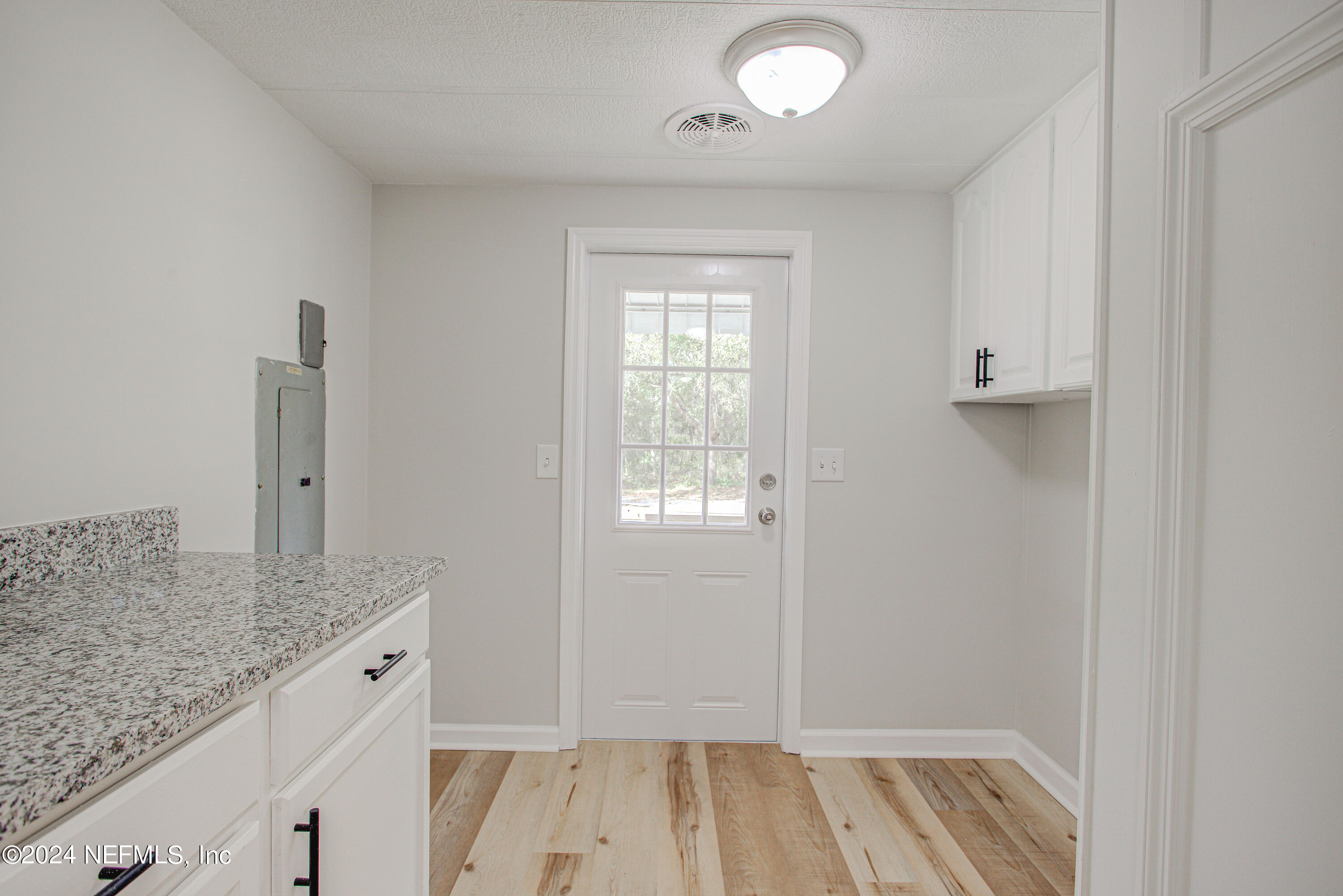 7677 Oak Forest Road Keystone Heights, FL 32656 - Photo 22 of 54 a bathroom with a granite countertop sink and granite top