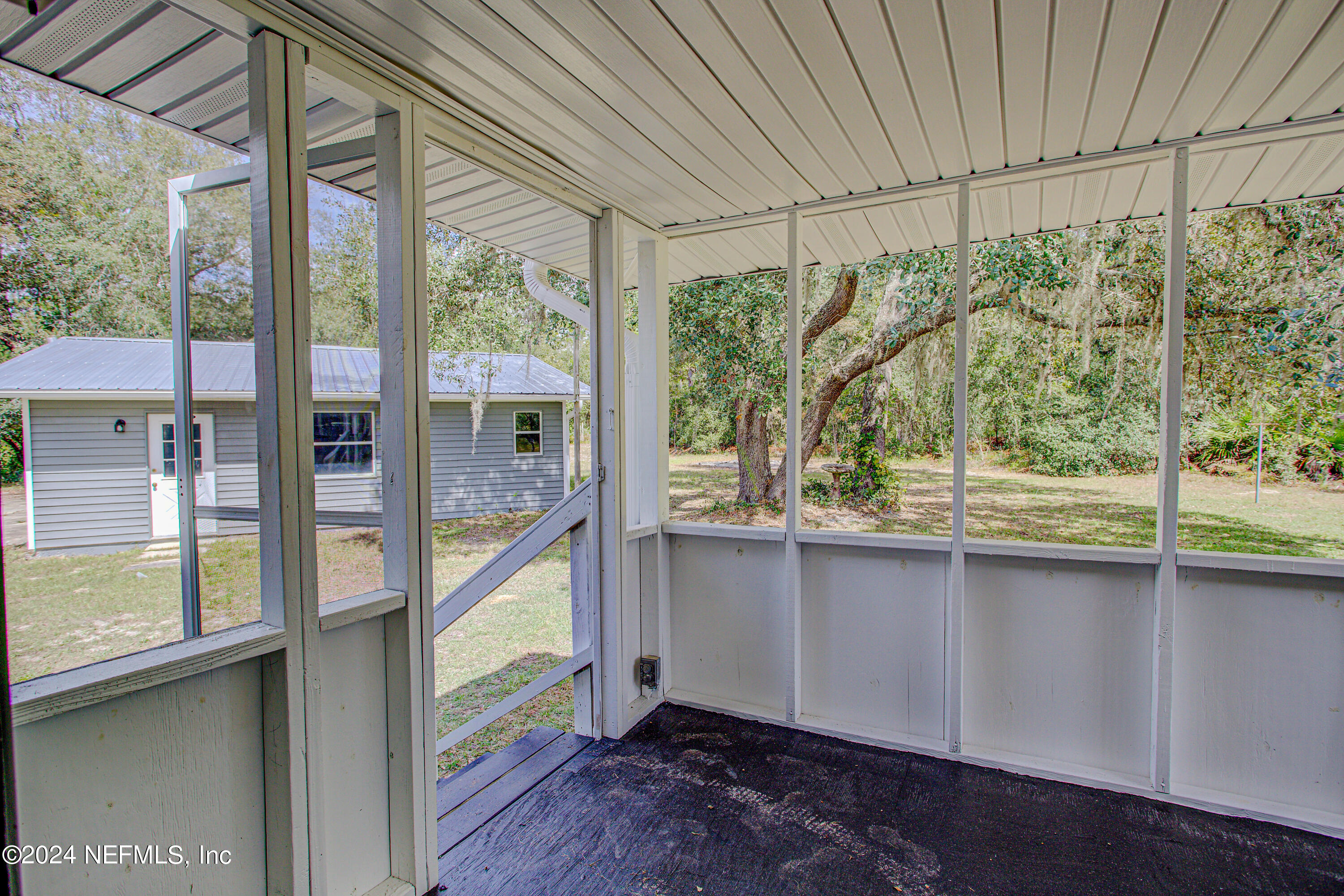 7677 Oak Forest Road Keystone Heights, FL 32656 - Photo 35 of 54 a view of a room that has a large window
