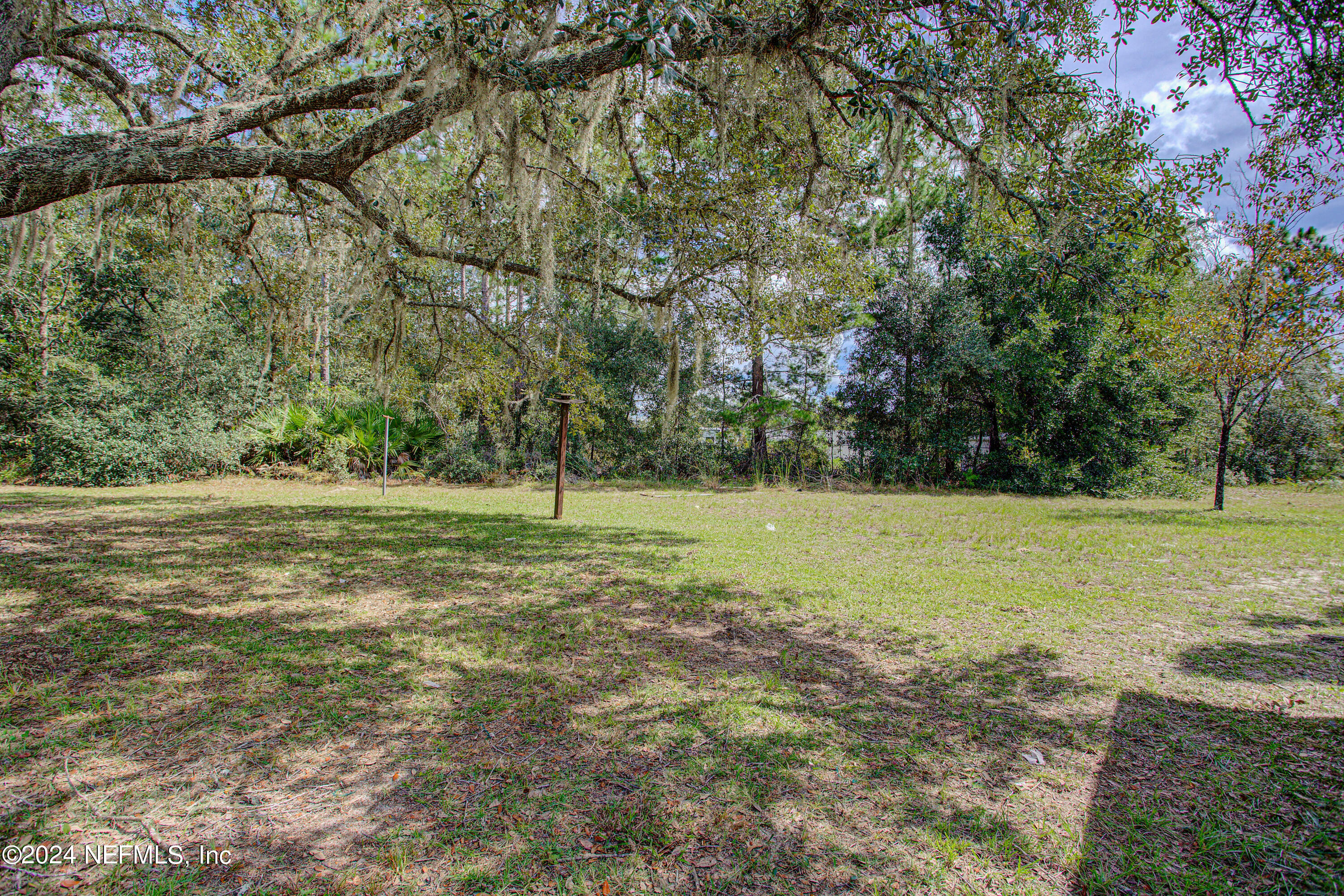 7677 Oak Forest Road Keystone Heights, FL 32656 - Photo 37 of 54 a view of a field with trees