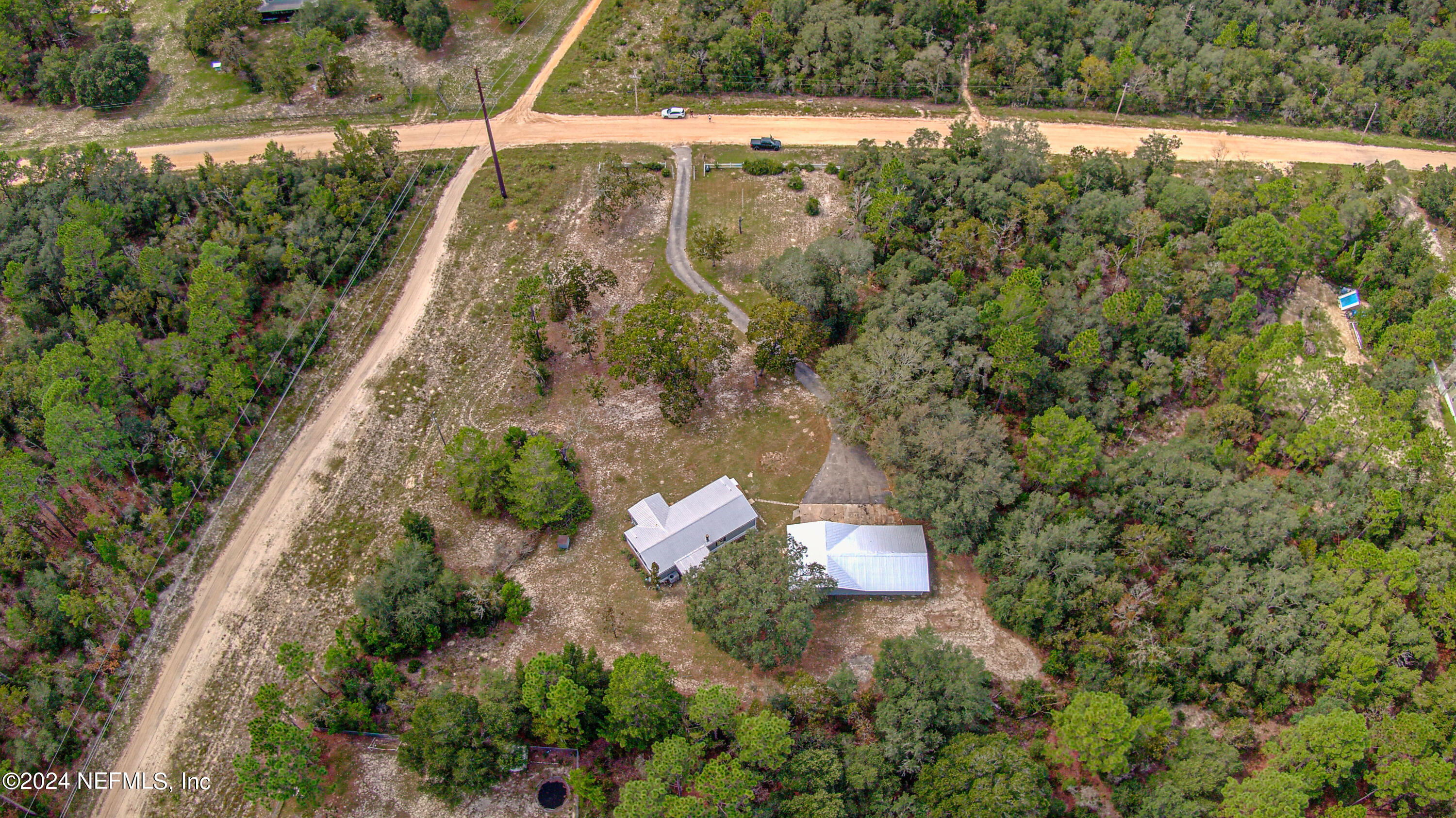 7677 Oak Forest Road Keystone Heights, FL 32656 - Photo 49 of 54 an aerial view of a house with a yard